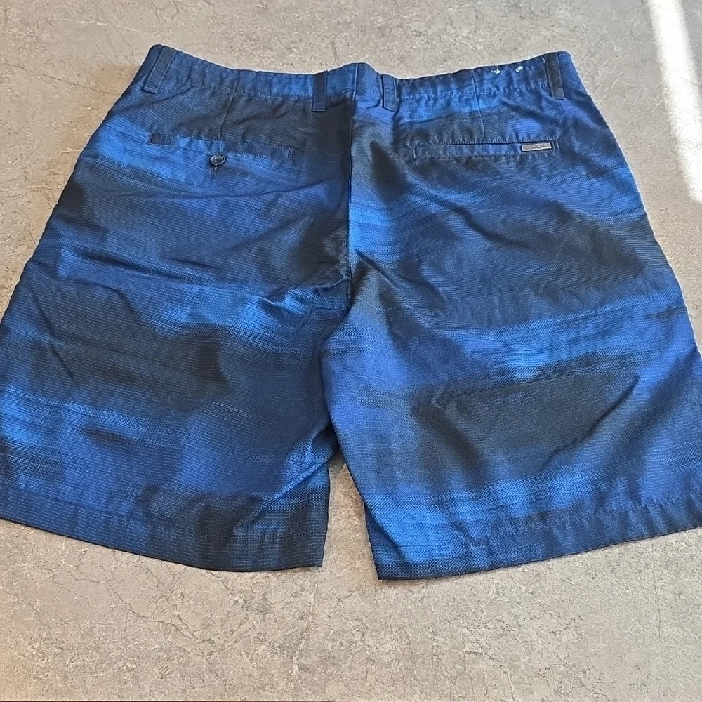 (J47) Greg Norman Mens Blue Swim Shorts Sz 34